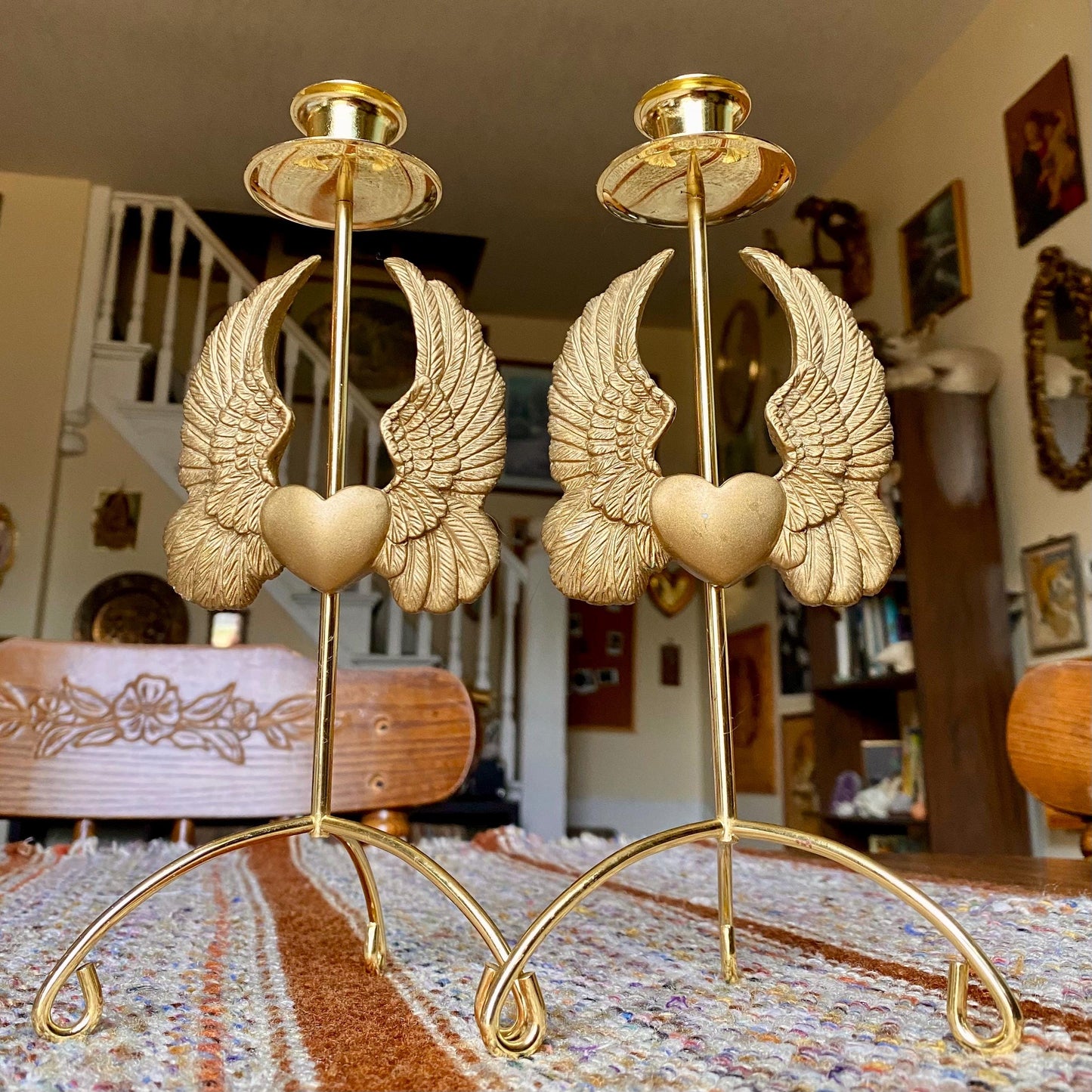 Set of Two Vintage Brass Pillar Candle Holders Adorned with Ornate Hearts with Wings