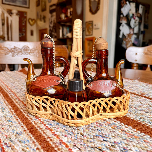 Vintage Spanish Amber Glass Oil and Vinegar Cruet Bottles with Salt and Pepper Shakers in Wicker Caddy