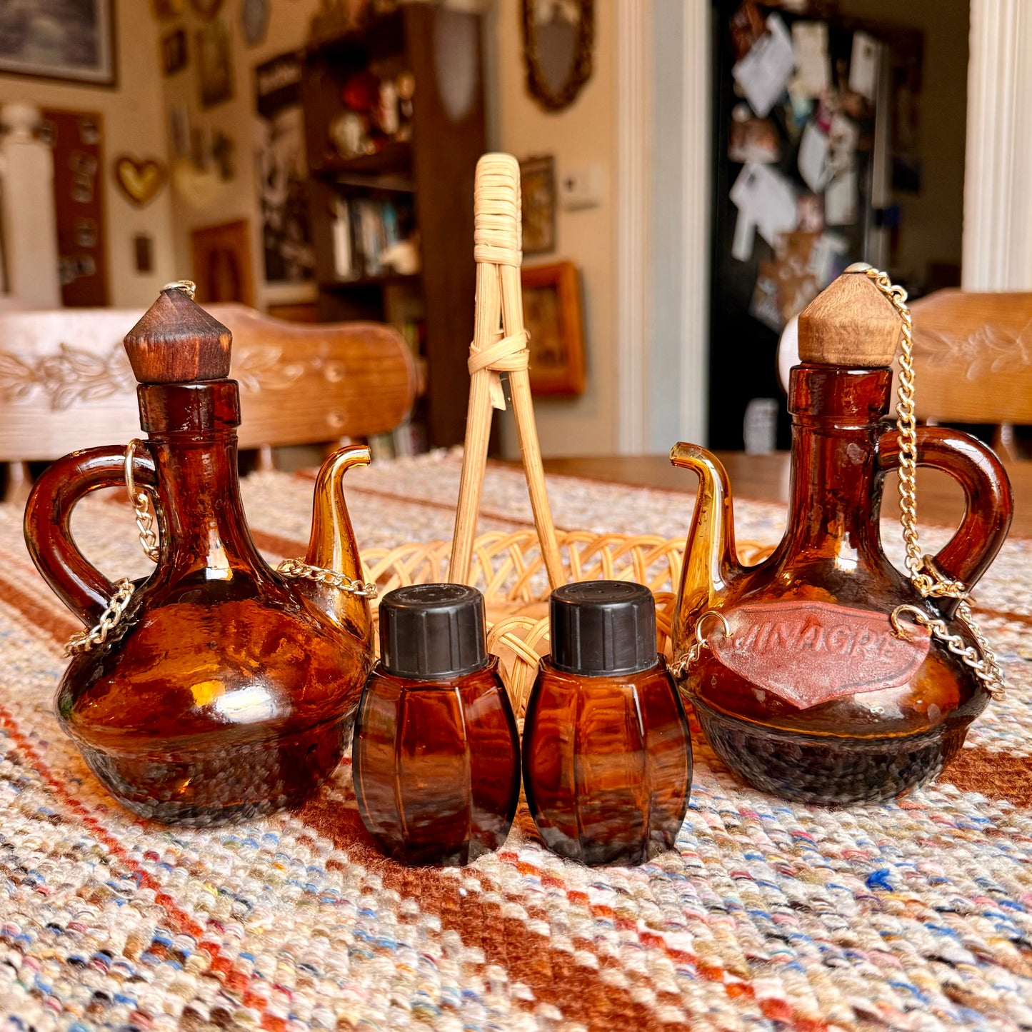 Vintage Spanish Amber Glass Oil and Vinegar Cruet Bottles with Salt and Pepper Shakers in Wicker Caddy
