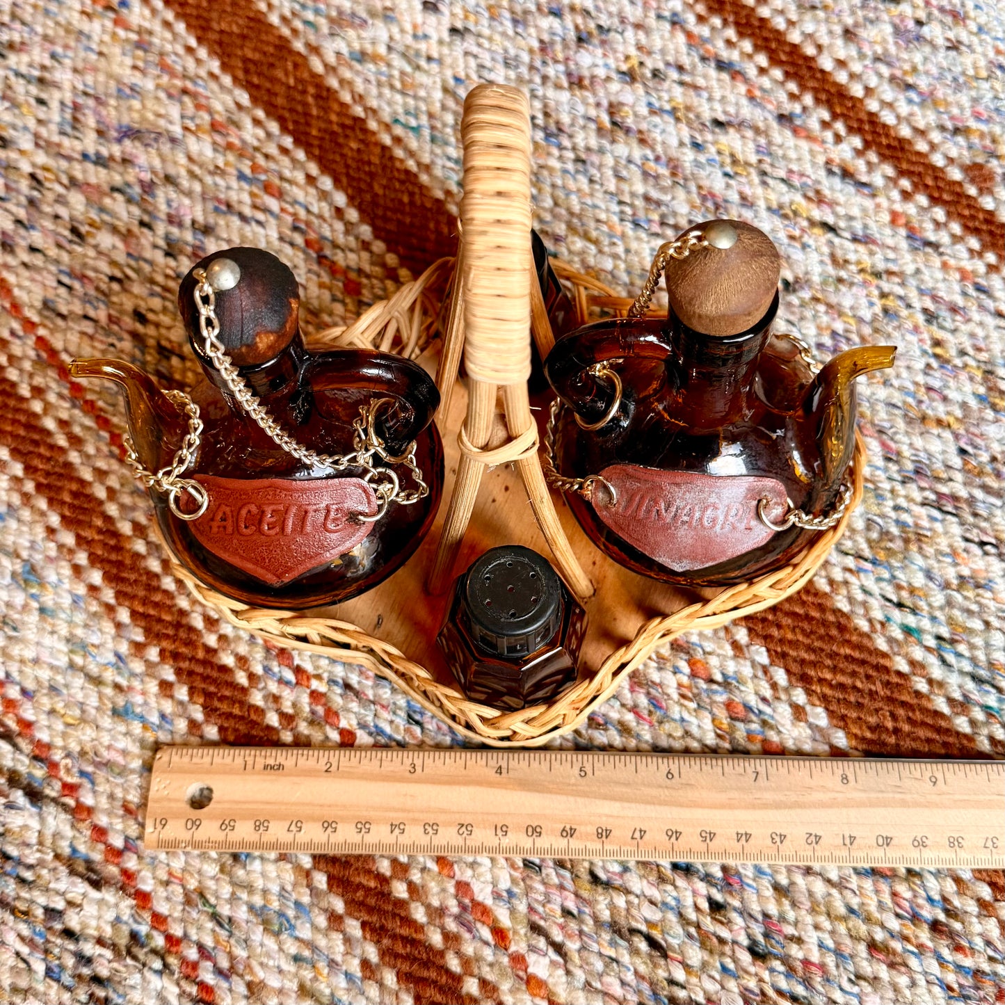 Vintage Spanish Amber Glass Oil and Vinegar Cruet Bottles with Salt and Pepper Shakers in Wicker Caddy
