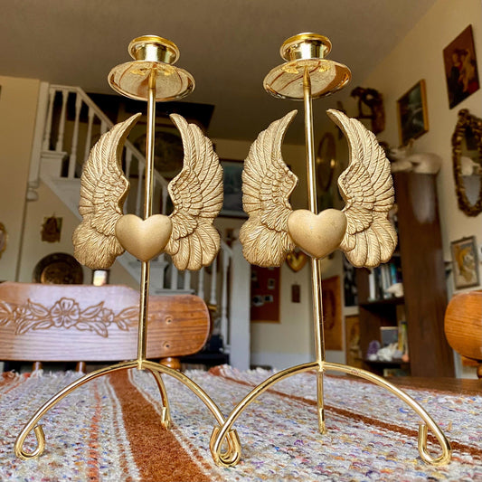 Set of Two Vintage Brass Pillar Candle Holders Adorned with Ornate Hearts with Wings