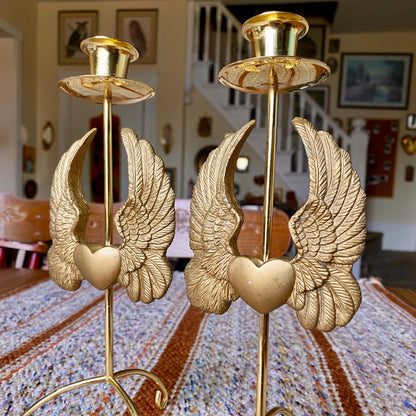 Set of Two Vintage Brass Pillar Candle Holders Adorned with Ornate Hearts with Wings