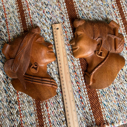 Vintage Pair of Folk Art Tribal Hand Carved Wooden Wall Hanging Head Sculptures
